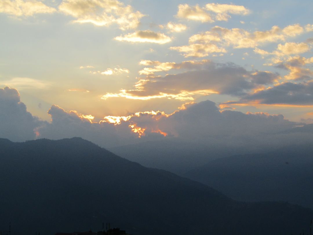 Scenic view of mountains against sky at sunset - Free Images, Stock Photos and Pictures on Pikwizard.com