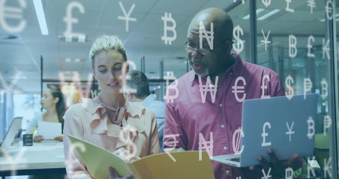 Colleagues Collaborating on Financial Reports in Office Setting