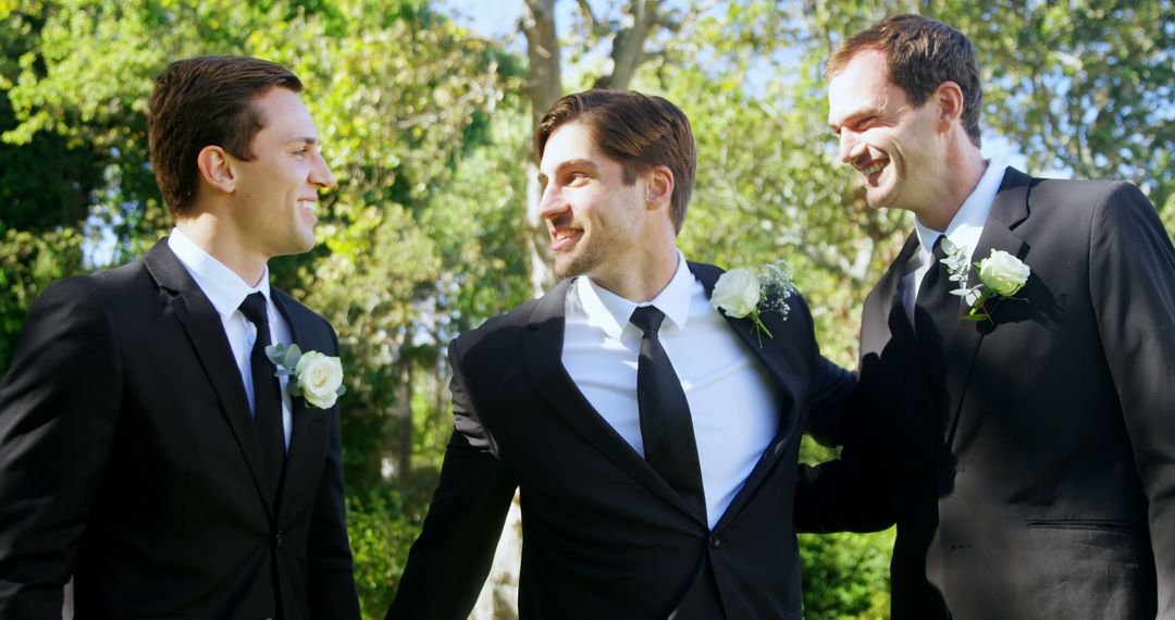 Groomsmen Smiling and Celebrating Wedding in Garden - Free Images, Stock Photos and Pictures on Pikwizard.com