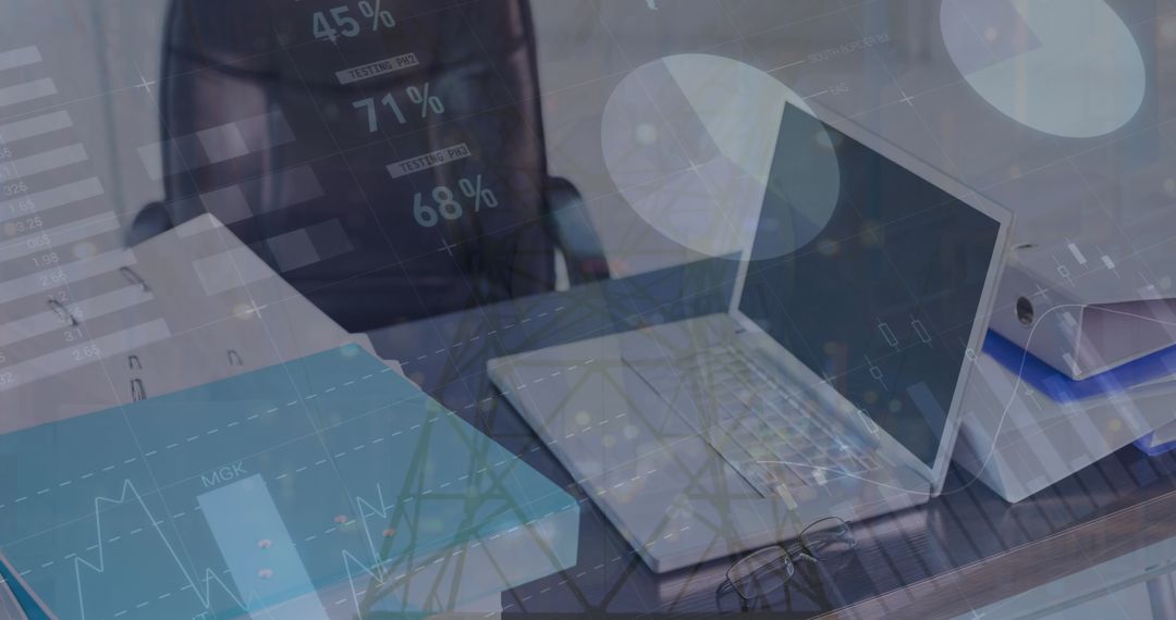 Office Desk with Laptop and File Documents Mixed with Statistical Data