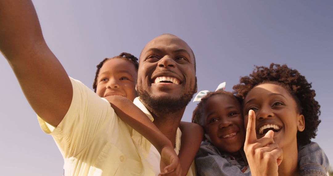 Happy Family Taking Selfie on a Sunny Day - Free Images, Stock Photos and Pictures on Pikwizard.com