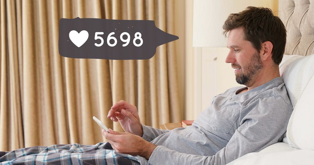 Man in Bed Using Smartphone with Social Media Notification