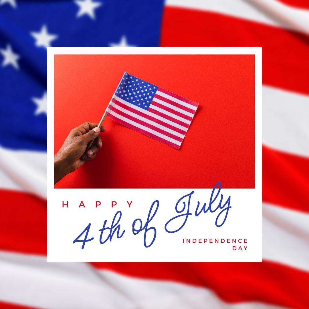 Hand Holding Small American Flag for 4th of July Celebration