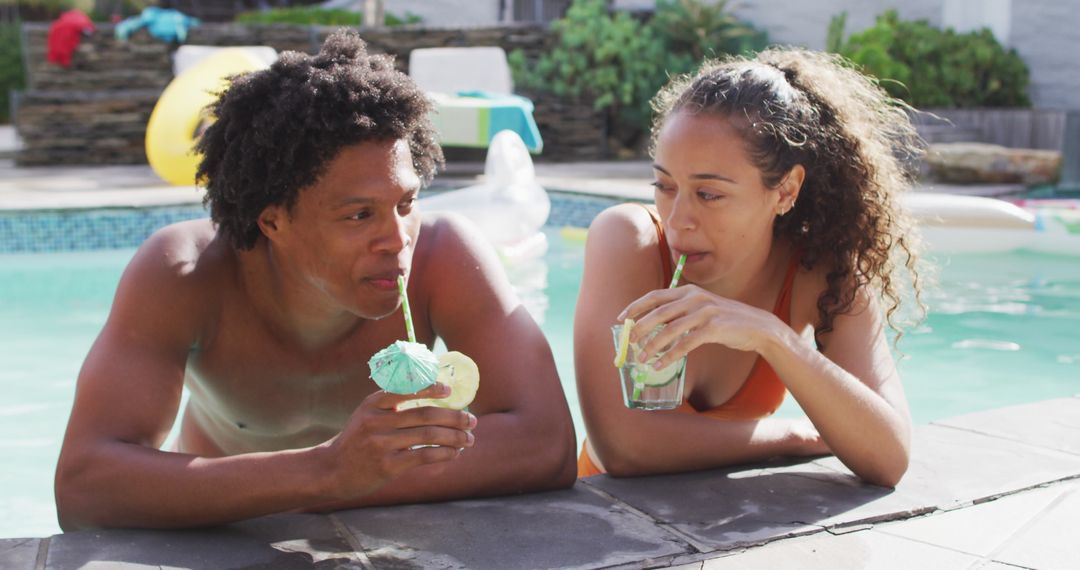 Diverse Friends Enjoying Poolside Drinks at Summer Gathering