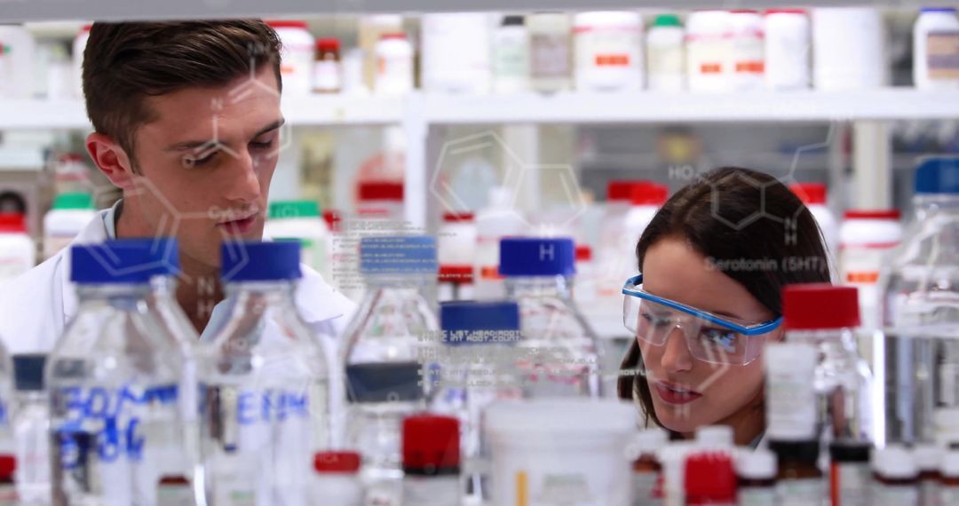 Two Scientists Analyzing Samples in Modern Laboratory