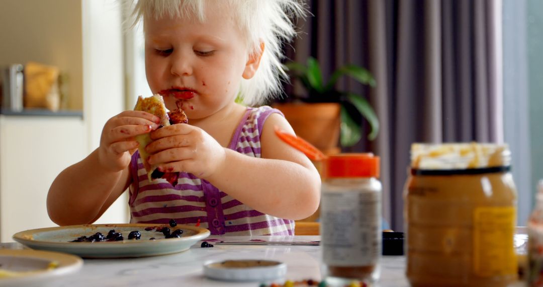 Toddler Enjoying Pancake Breakfast at Home