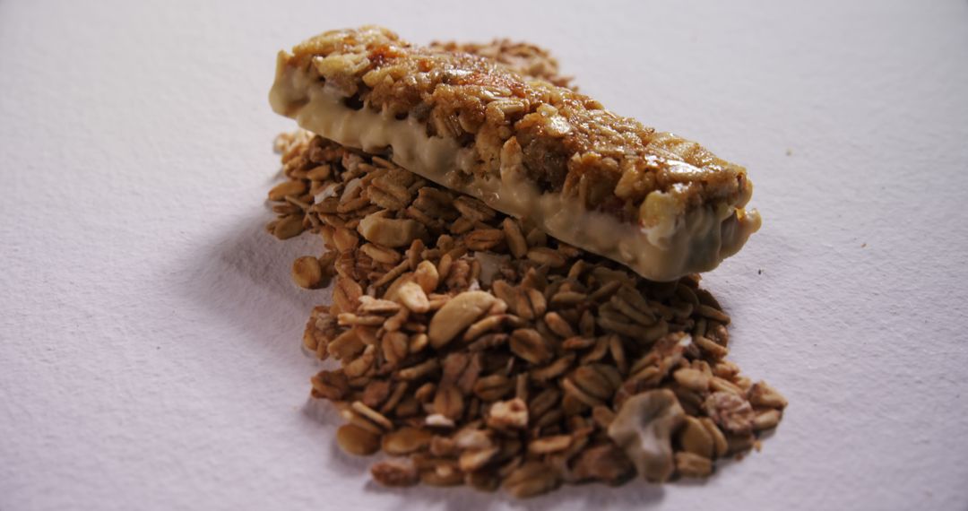 Healthy Granola Bar with Oats on White Background - Free Images, Stock Photos and Pictures on Pikwizard.com