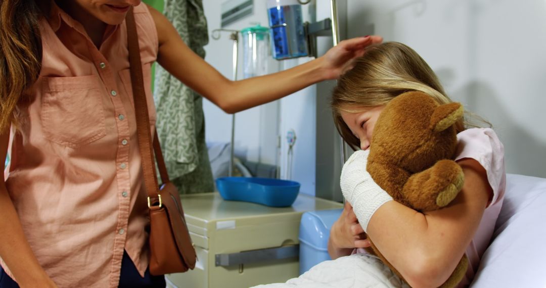 Comforting Child in Hospital with Teddy Bear - Free Images, Stock Photos and Pictures on Pikwizard.com