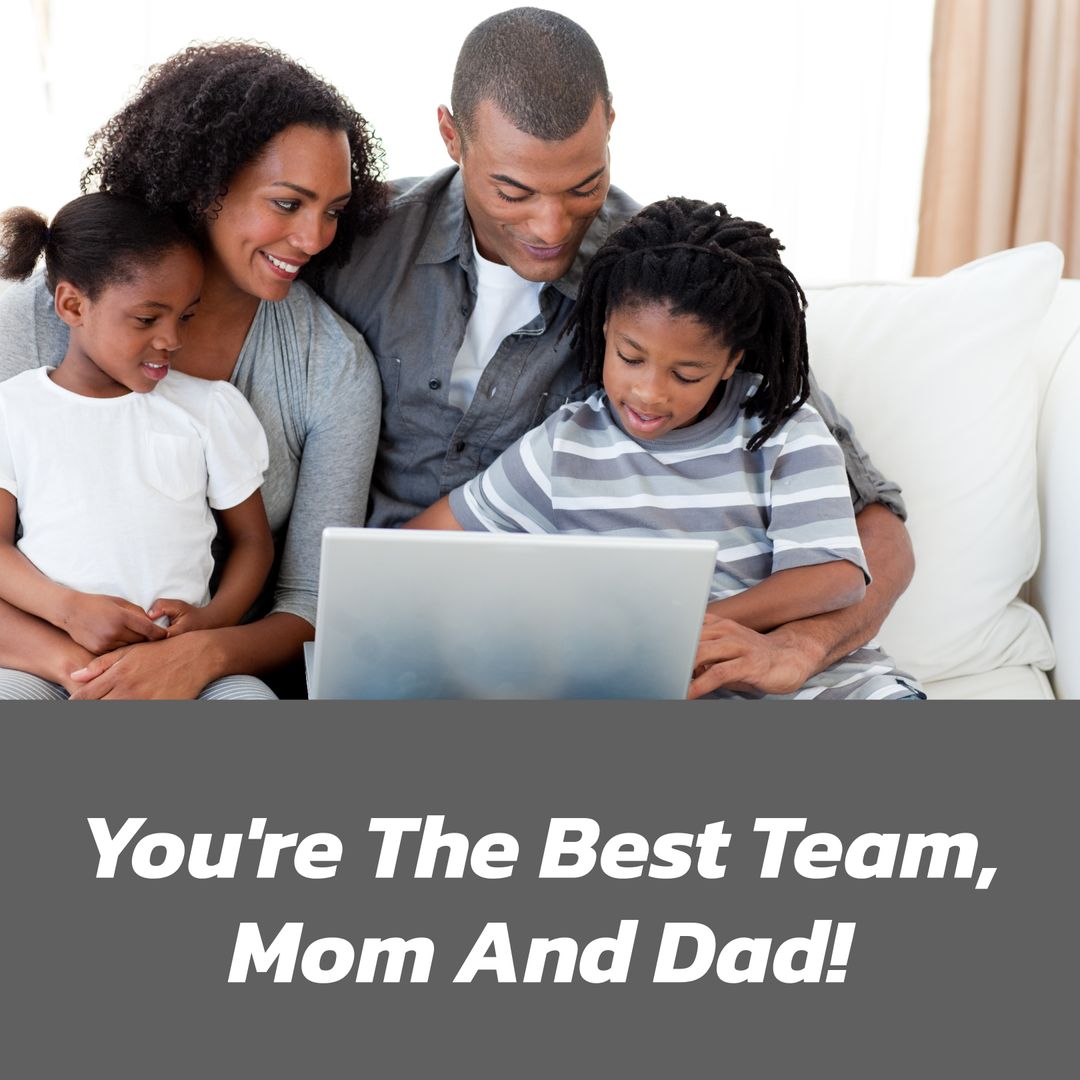 Happy African American Family Enjoying Quality Time Using Laptop