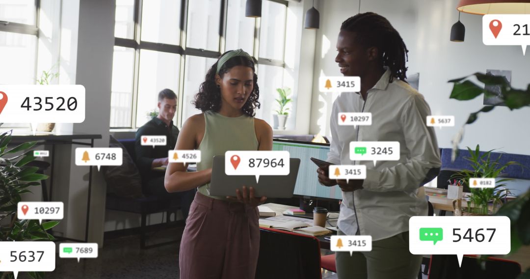 Diverse Coworkers Analyzing Data with Social Media Notifications