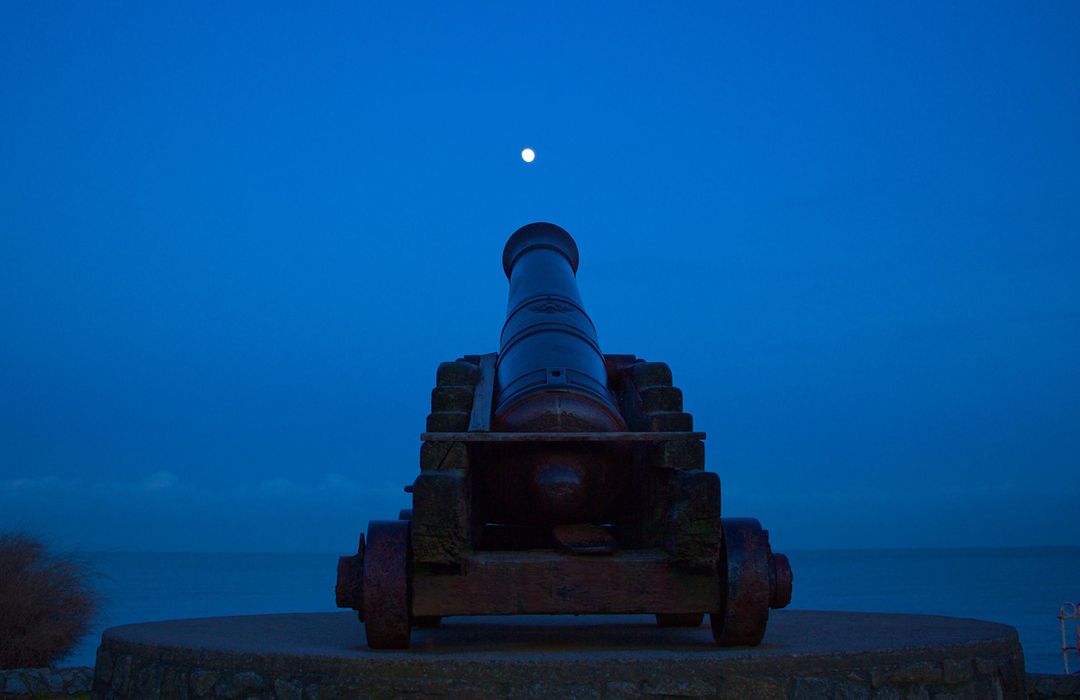 Historic Cannon at Dawn with Moon in Background Amidst Blue Sky - Free Images, Stock Photos and Pictures on Pikwizard.com