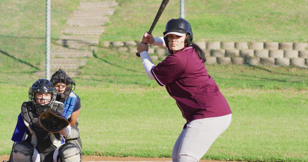 Female Softball Batter Preparing to Hit During Game - Free Images, Stock Photos and Pictures on Pikwizard.com