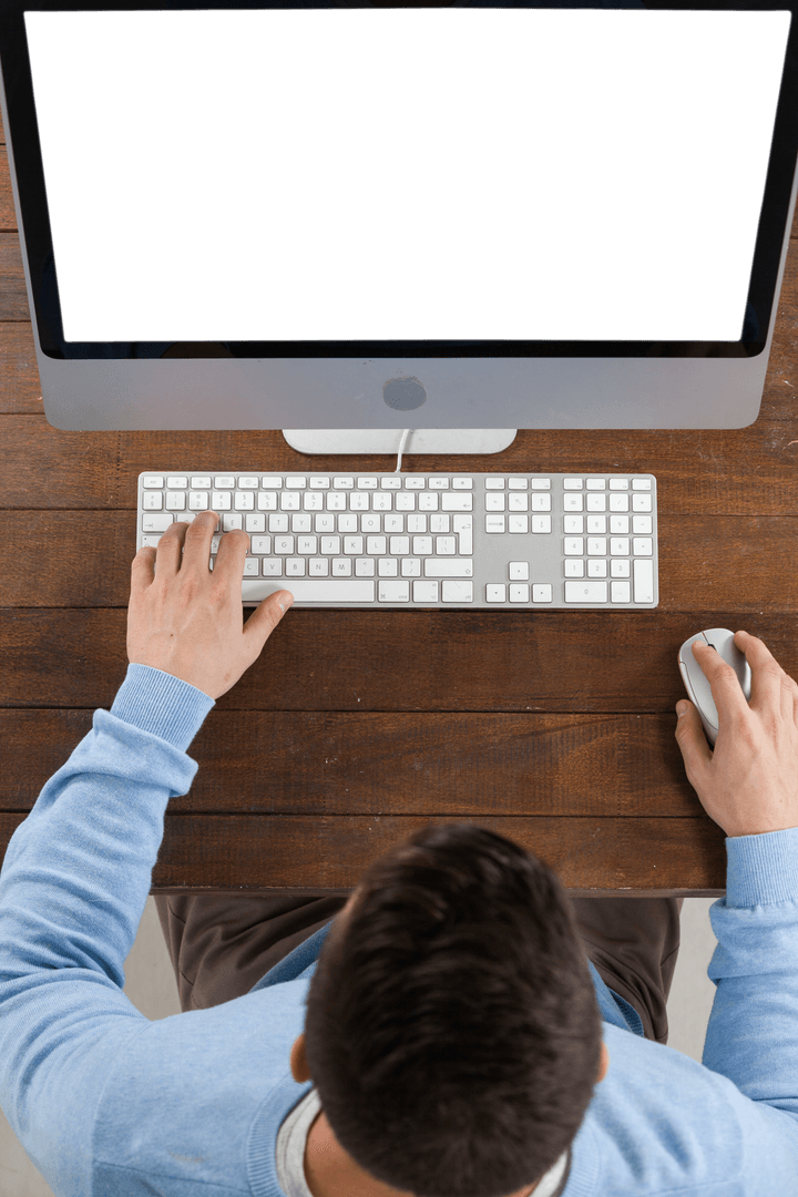 Man Working at Wooden Desk with Transparent Monitor