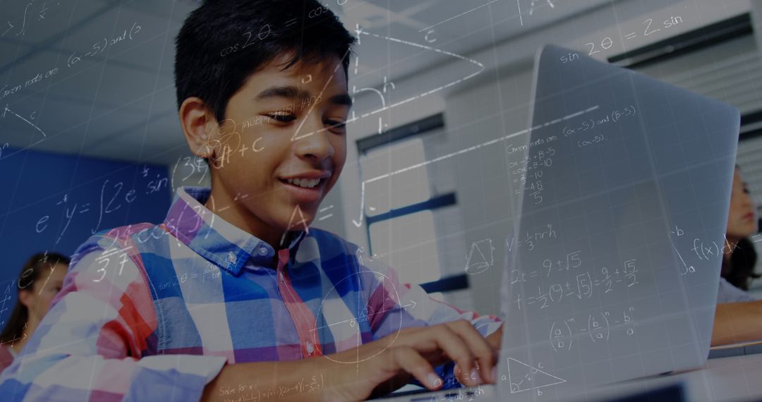Schoolboy Engaged in Learning with Laptop and Math Equations