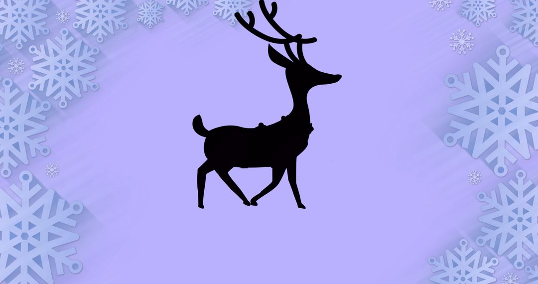 Silhouette of Reindeer Surrounded by Snowflakes on Purple Background - Free Images, Stock Photos and Pictures on Pikwizard.com