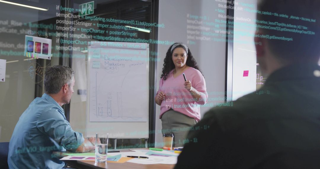 Woman Leading Business Data Presentation in Modern Office