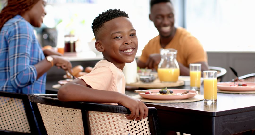 Happy Family Moment: Joyful Lunch Gathering with Parents and Child