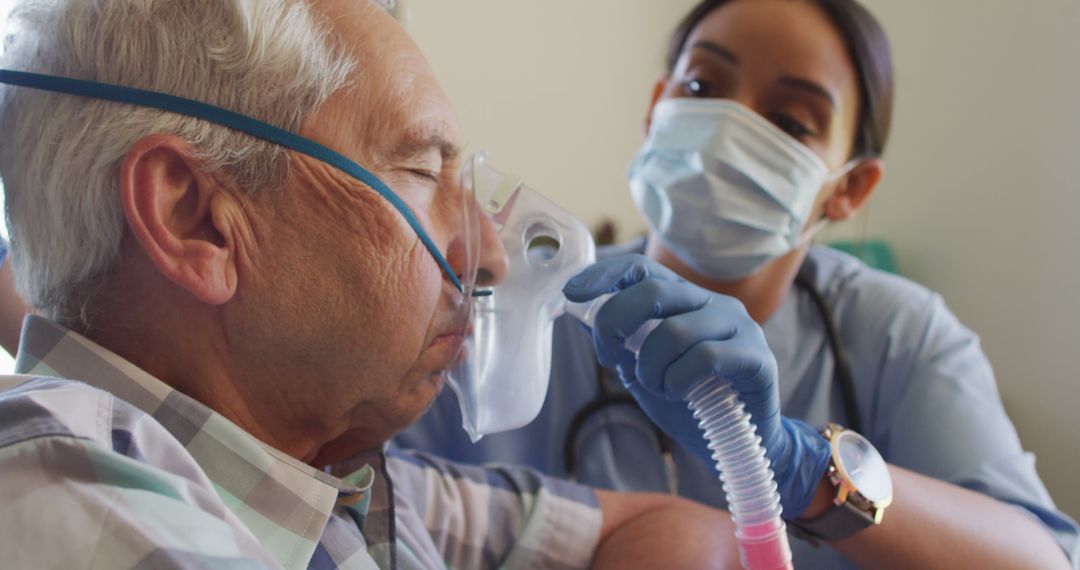 Nurse Assisting Elderly with Oxygen Mask - Free Images, Stock Photos and Pictures on Pikwizard.com