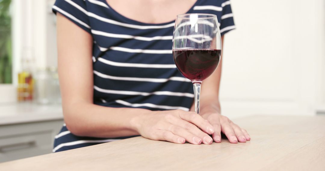 Woman Relaxing at Home with Glass of Red Wine - Free Images, Stock Photos and Pictures on Pikwizard.com