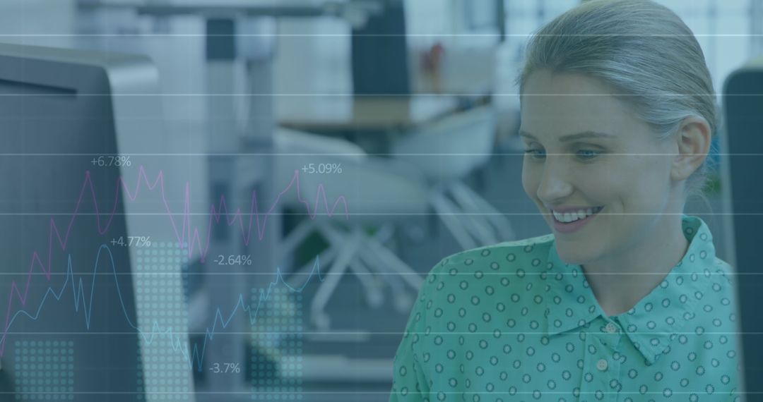 Businesswoman Analyzing Data Trends on Computer Screen