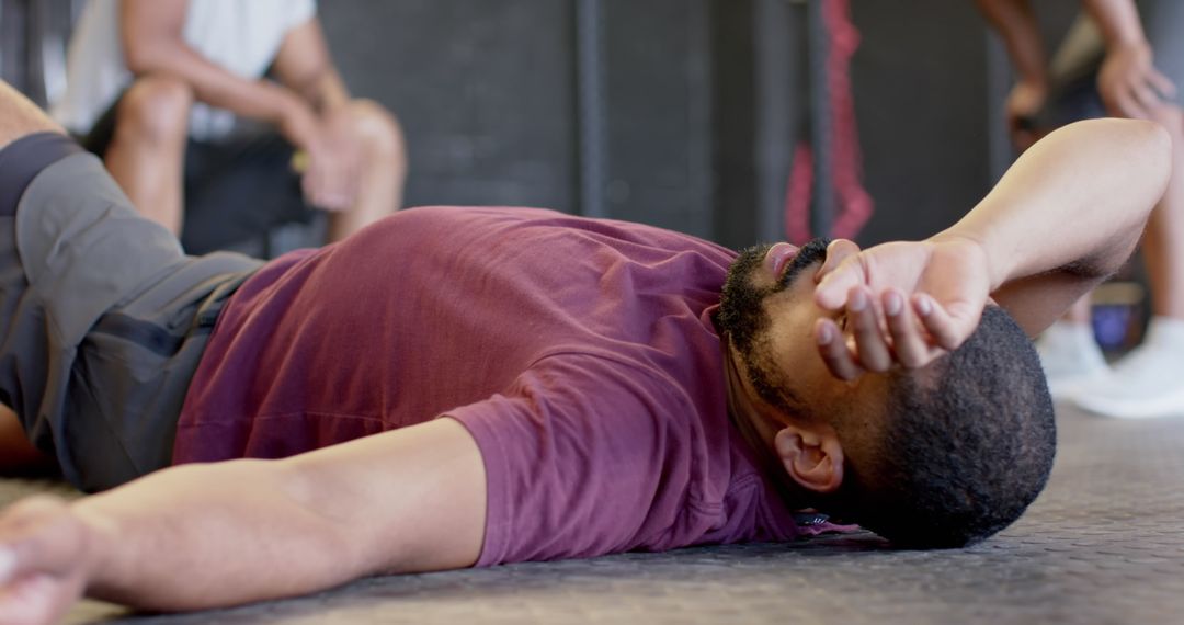 Exhausted Man Resting After Intense Gym Session