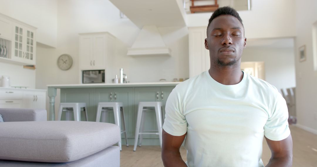 Serene Man Meditating in Modern Home Interior