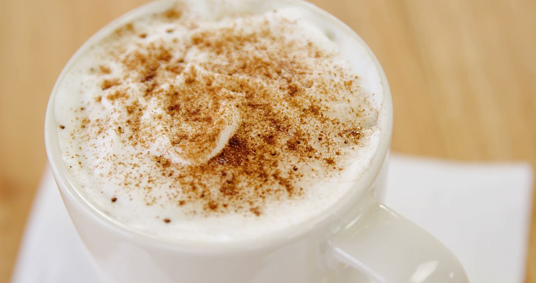 Close-up of a Cappuccino with Cinnamon Sprinkle - Free Images, Stock Photos and Pictures on Pikwizard.com