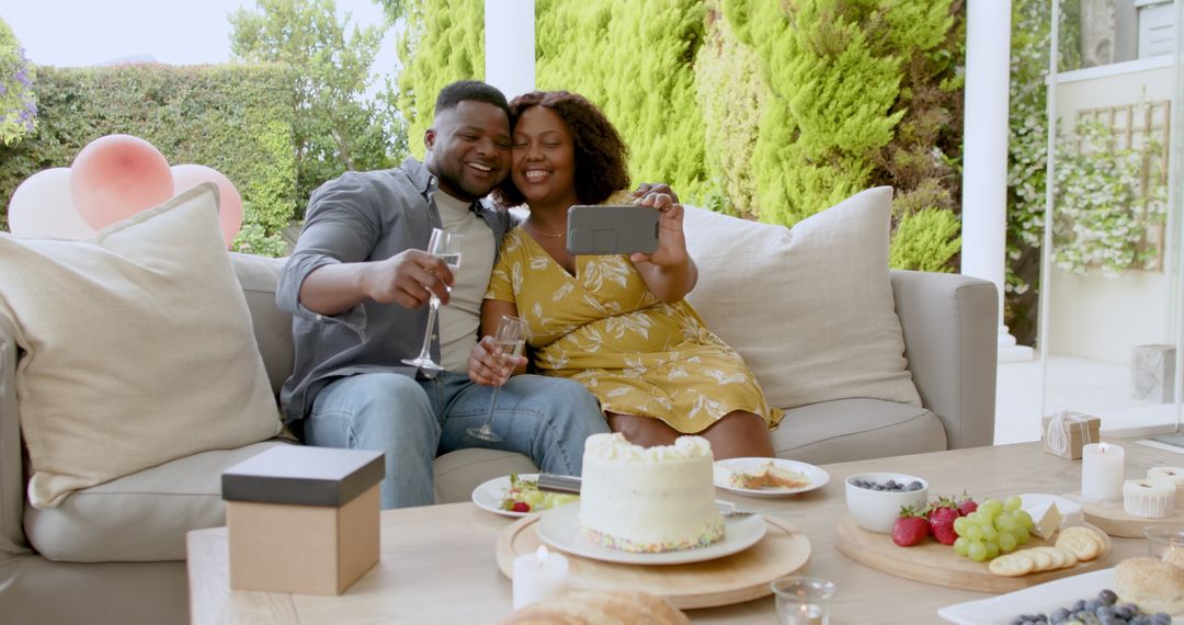 Romantic Couple Enjoying Dessert and Wine on Patio