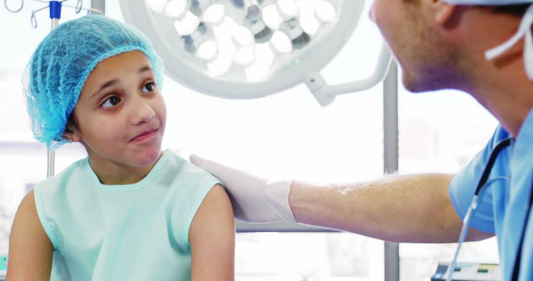 Young Patient Comforted by Doctor Before Surgery - Free Images, Stock Photos and Pictures on Pikwizard.com