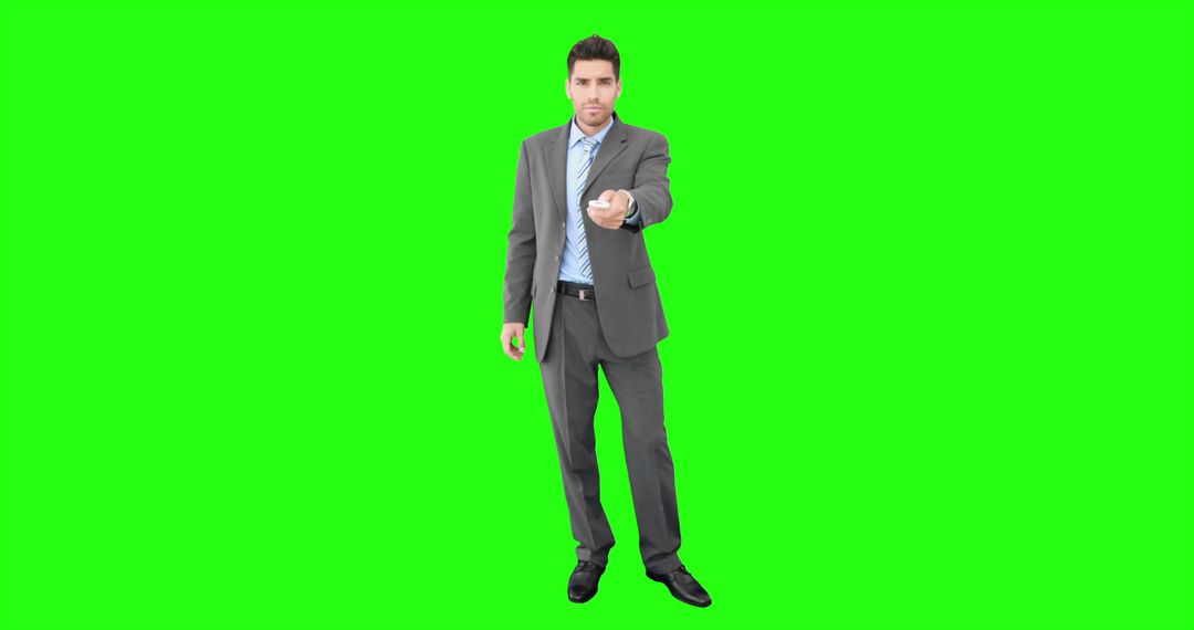 Businessman Pointing in Green Screen Background - Free Images, Stock Photos and Pictures on Pikwizard.com