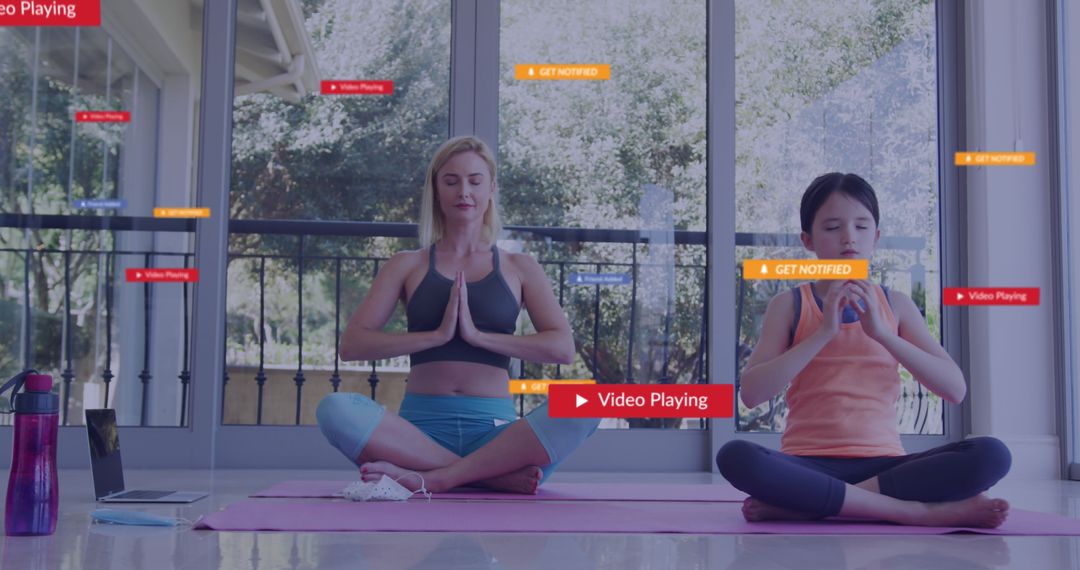 Mother and Daughter Meditating with Digital Media Interfaces