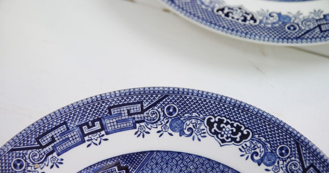 Close-Up of Decorative Blue and White Ceramic Plates with Traditional Patterns - Free Images, Stock Photos and Pictures on Pikwizard.com