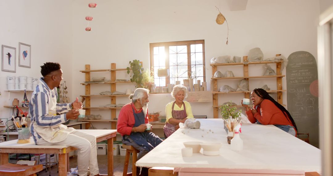 Diverse Group of People Enjoying Pottery Class in Bright Studio - Free Images, Stock Photos and Pictures on Pikwizard.com