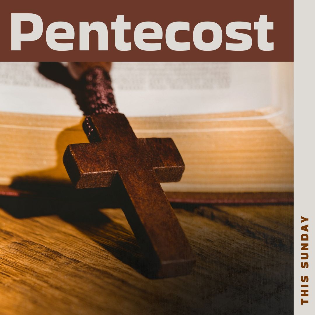 Pentecost Celebration with Bible and Rosary Cross on Wooden Surface