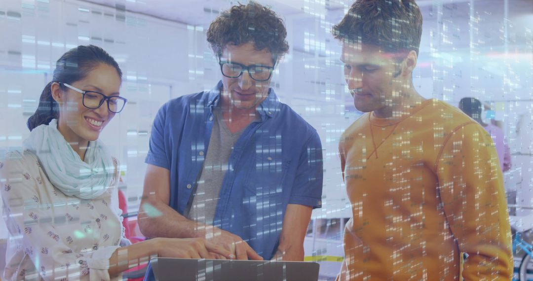 Diverse Tech Team Collaborating on Laptop with Digital Interface Overlay