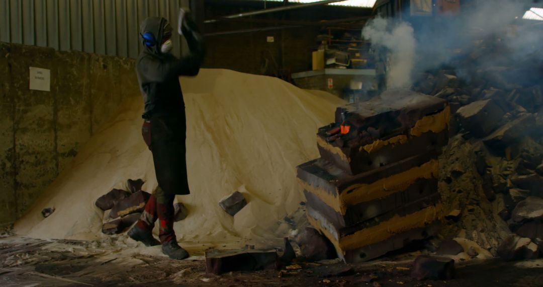 Industrial Worker Pouring Molten Metal in Foundry - Free Images, Stock Photos and Pictures on Pikwizard.com