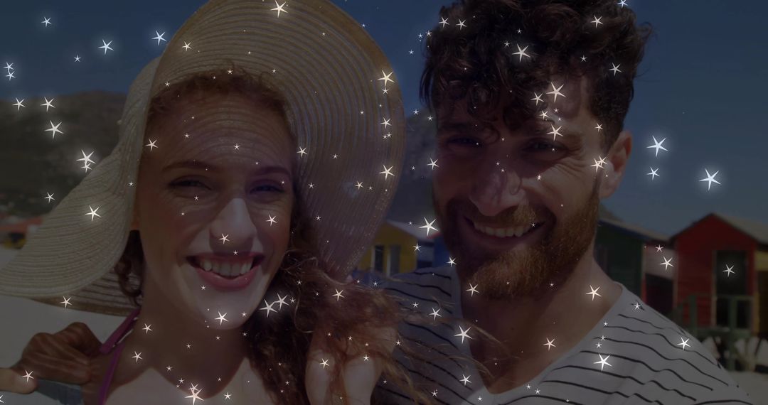 Joyful Couple Enjoying Sunny Beach Day with Sparkling Effect