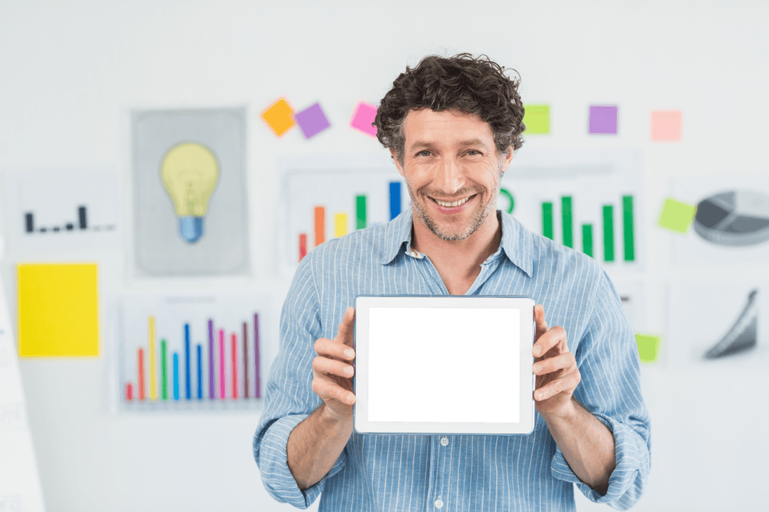 smiling man with transparent tablet display in office setting - Download Free Stock Images Pikwizard.com