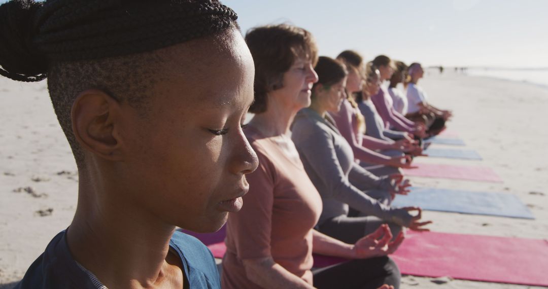 Group Meditating on Beach during Sunrise with Diverse Participants - Free Images, Stock Photos and Pictures on Pikwizard.com