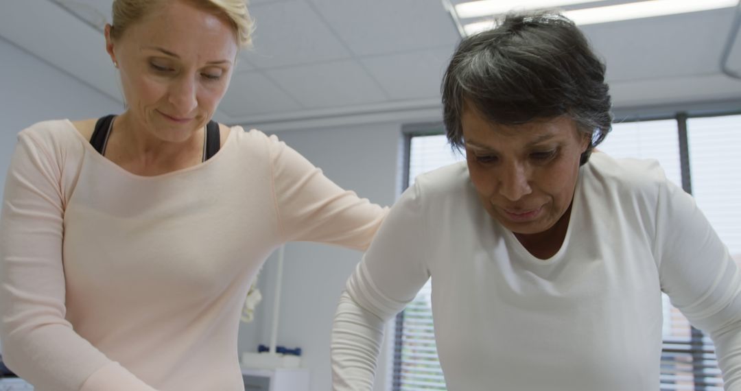 Physical therapist assisting senior woman during rehabilitation - Free Images, Stock Photos and Pictures on Pikwizard.com