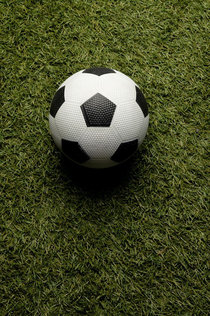 Directly above shot of soccer ball on grassy field, copy space - Free Images, Stock Photos and Pictures on Pikwizard.com
