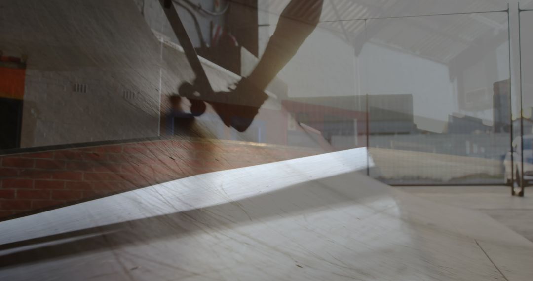 Double Exposure of Skateboarder in Action at Indoor Park
