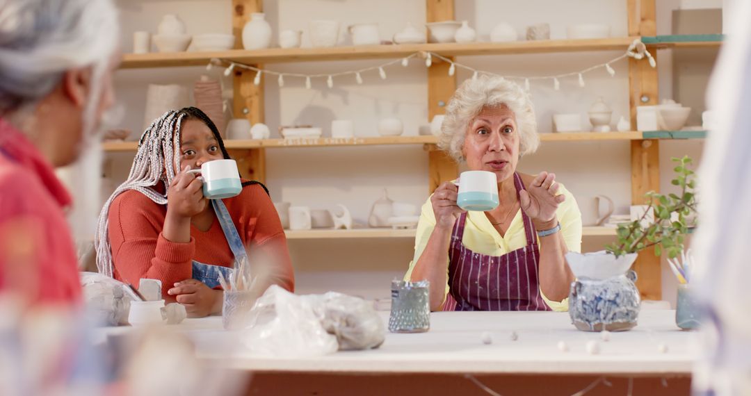 Diverse Senior Women in Pottery Class Having Tea and Conversation - Free Images, Stock Photos and Pictures on Pikwizard.com