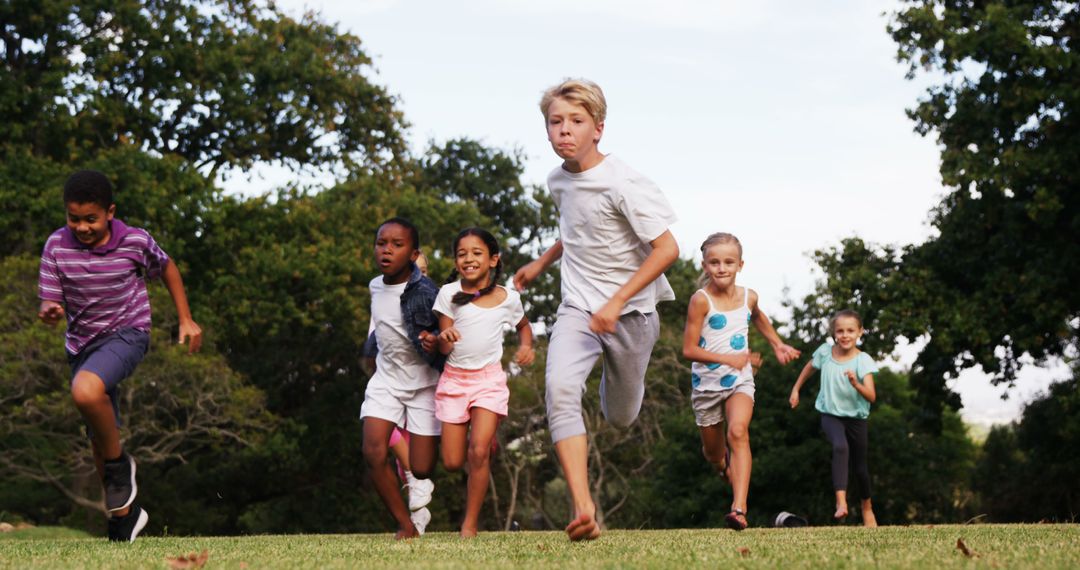 Diverse Group of Children Running Outside on a Sunny Day - Free Images, Stock Photos and Pictures on Pikwizard.com