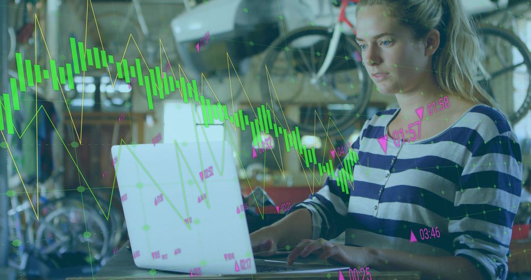 Focused Woman Analyzing Stock Chart on Laptop