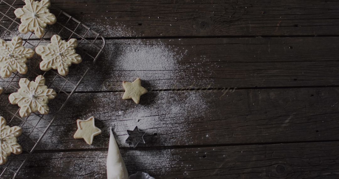 Rustic Baking Scene with Star-Shaped Cookies and Powdered Sugar