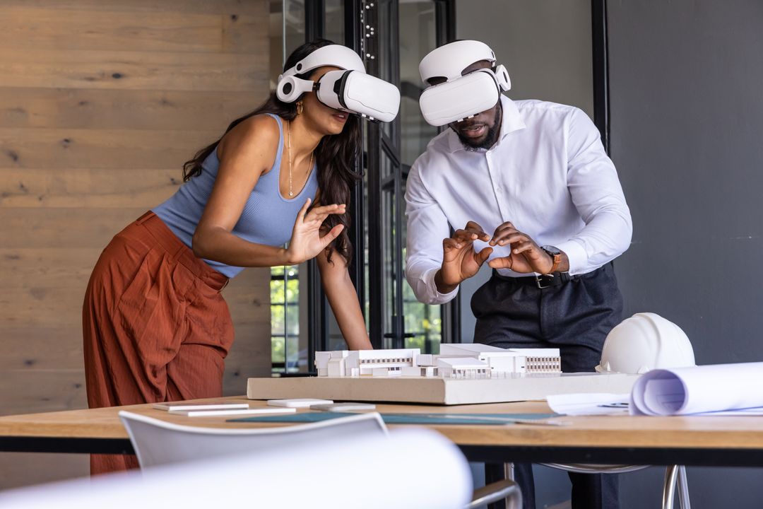 Teams Exploring Architectural Models with VR in Modern Office