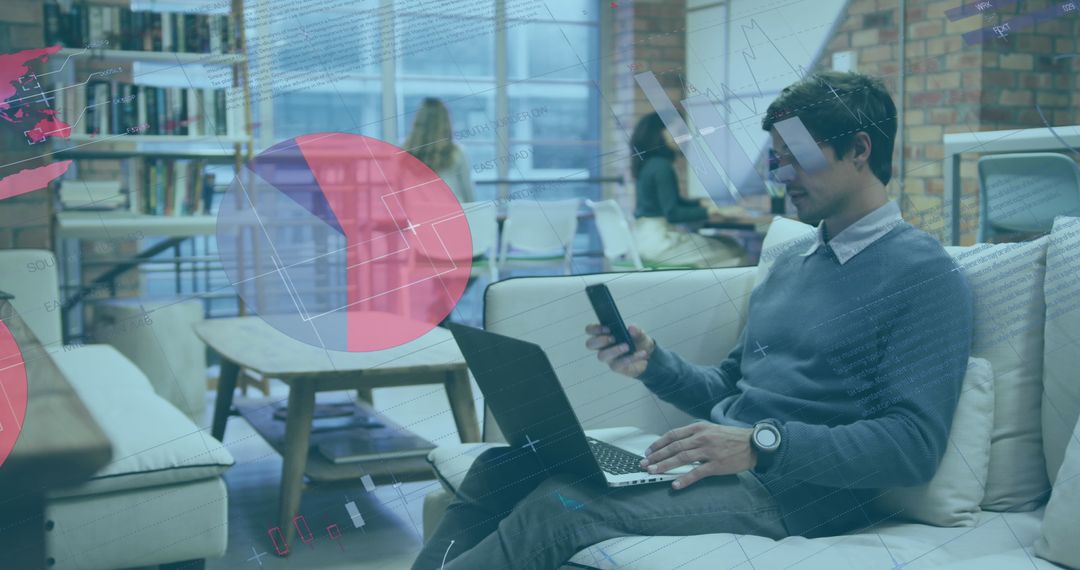 Multitasking Man on Phone Analyzing Marketing Data on Laptop