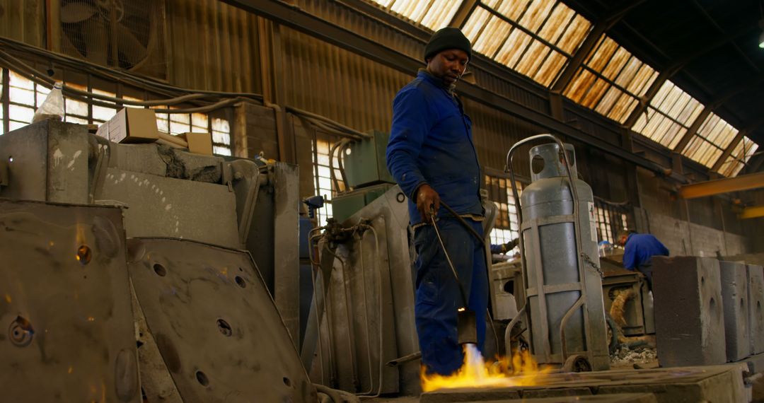 Industrial Worker Welding in Factory with Protective Gear - Free Images, Stock Photos and Pictures on Pikwizard.com