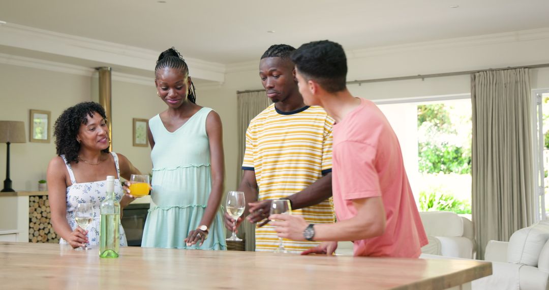 Diverse Friends Enjoying Drinks in Modern Home Setting